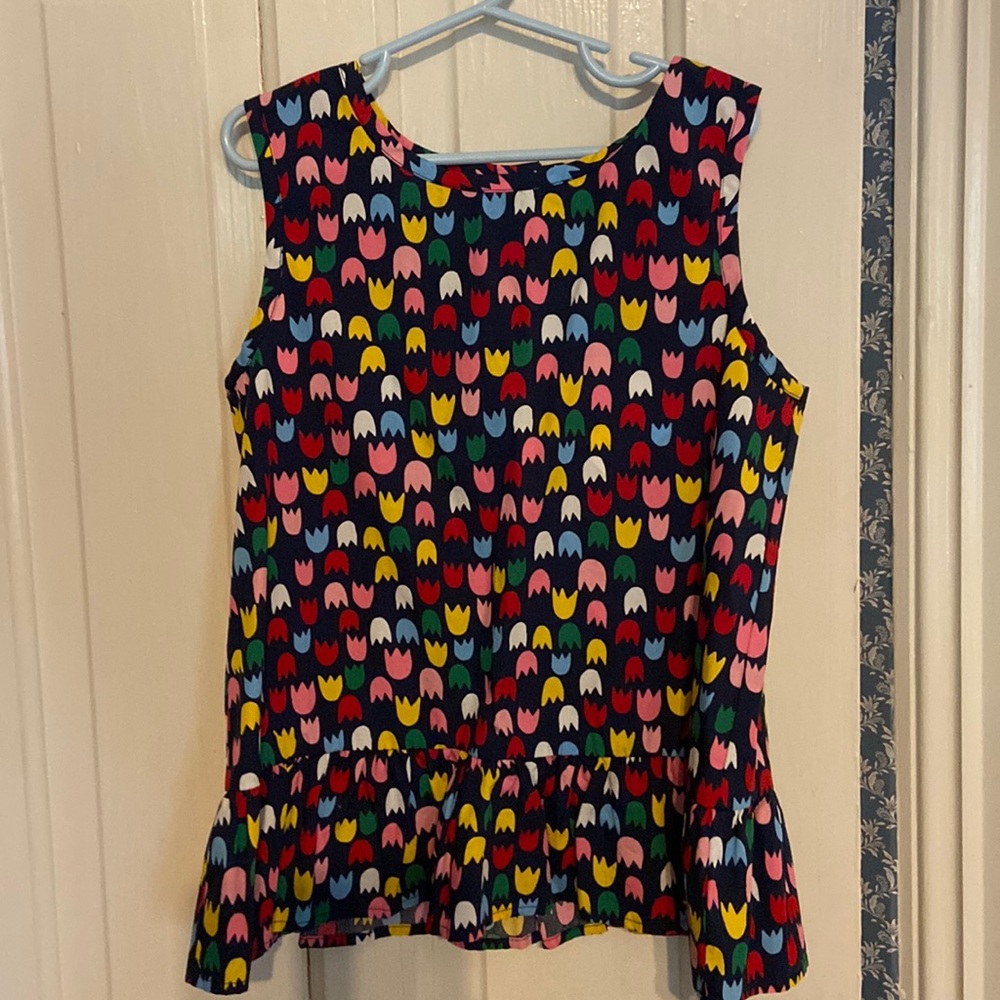 New with Tags! Hanna Andersson peplum tank with button closure back. Size 6-7